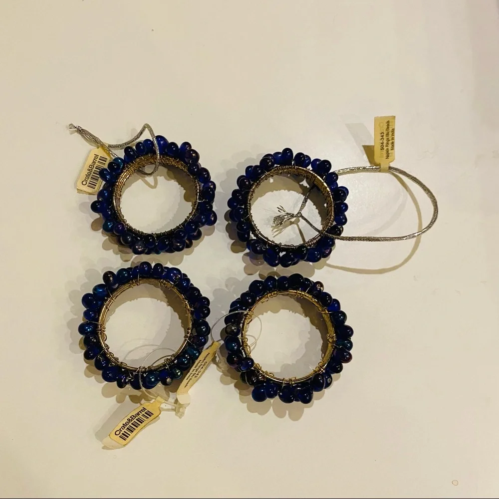 NWT Crate & Barrel 4 Napkin Rings.Blu Iridescent Beads.Great for casual or party